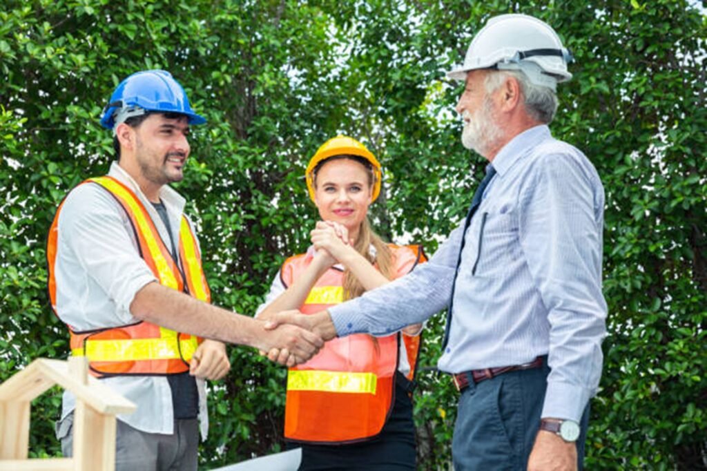 Professional tree service team discussing project details with homeowner after tree trimming job in Macedonia, OH